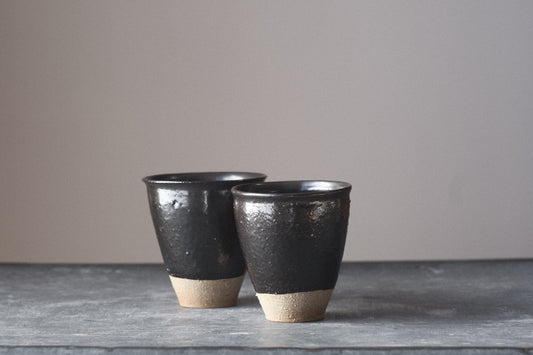 Brownish-black Beaker